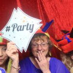 The birthday girl and friends celebrating in our photo booth - 60th photo booth
